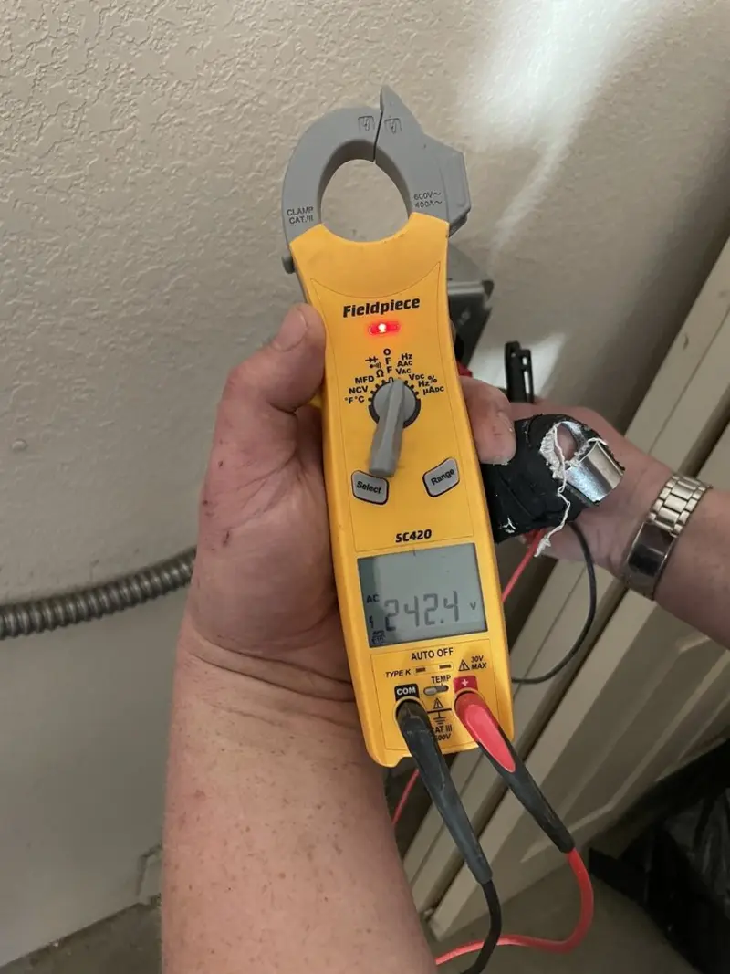 Voltage testing with clamp meter during Circuit Breaker Repair in Perkasie
